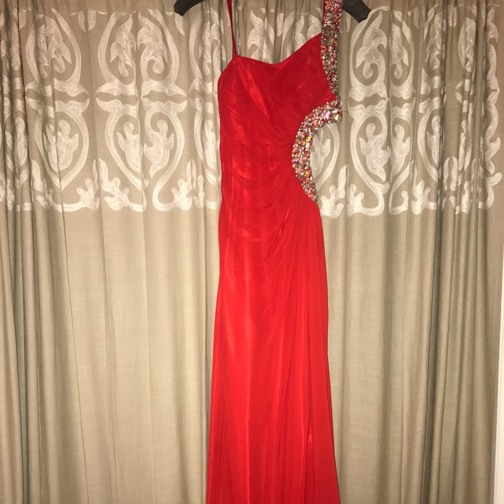 Bright red, open back prom or formal gown!