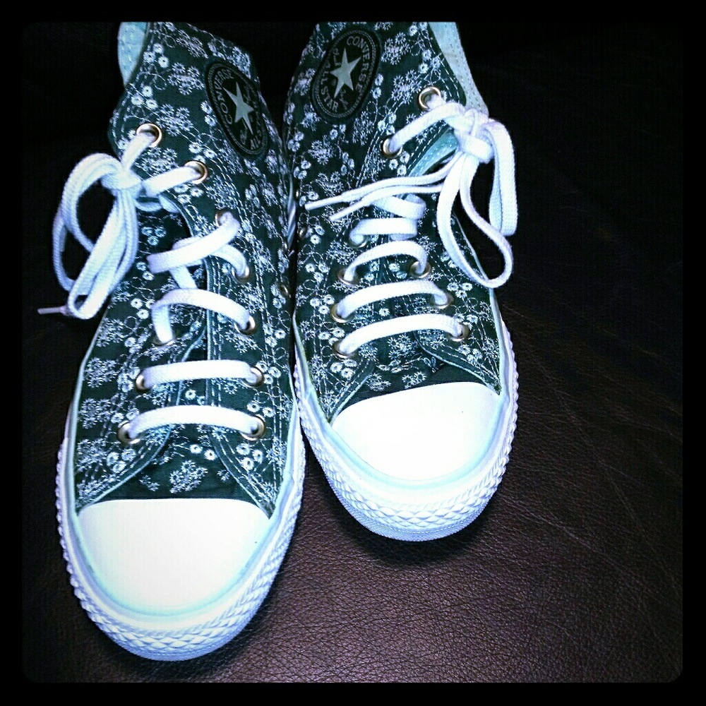 Green and white converse high tops