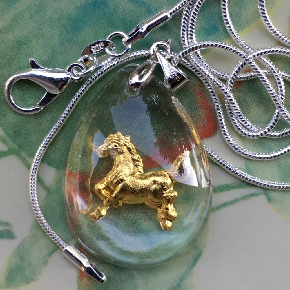 Golden Horse 🐎 pendant on silver chain