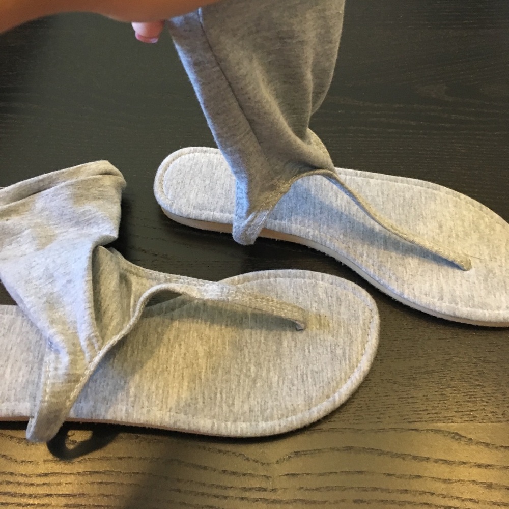 Grey up the ankle flip flops