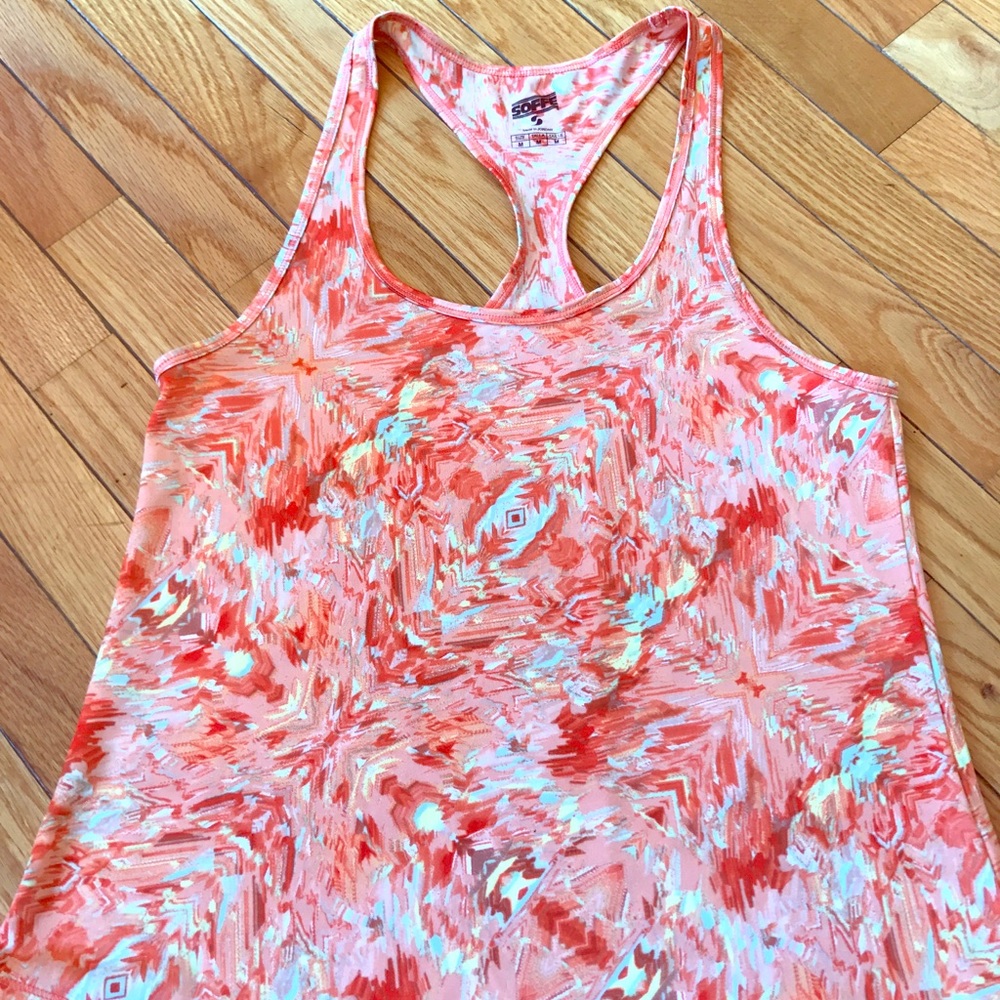 Soffee top. Worn rarely. Loose fitted