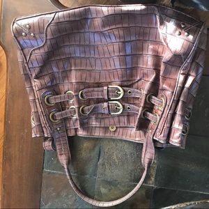 Brown purse with cute buckle details
