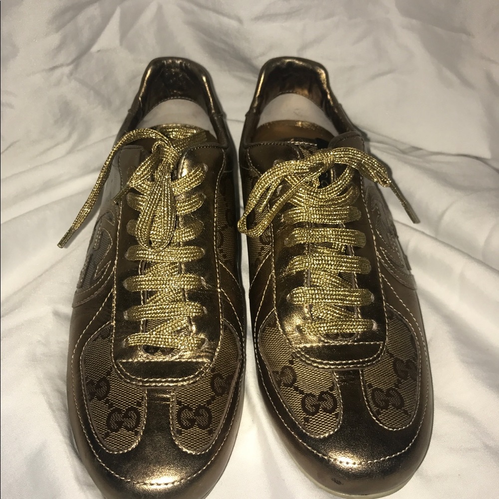 Gold Gucci sneaker