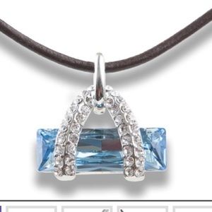 Blue topaz on leather band necklace