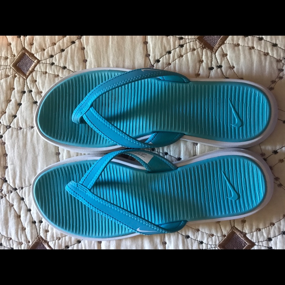 Women's aqua Nike sandals