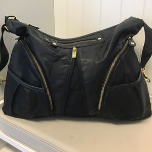 Skip hop black and gold diaper bag expandable