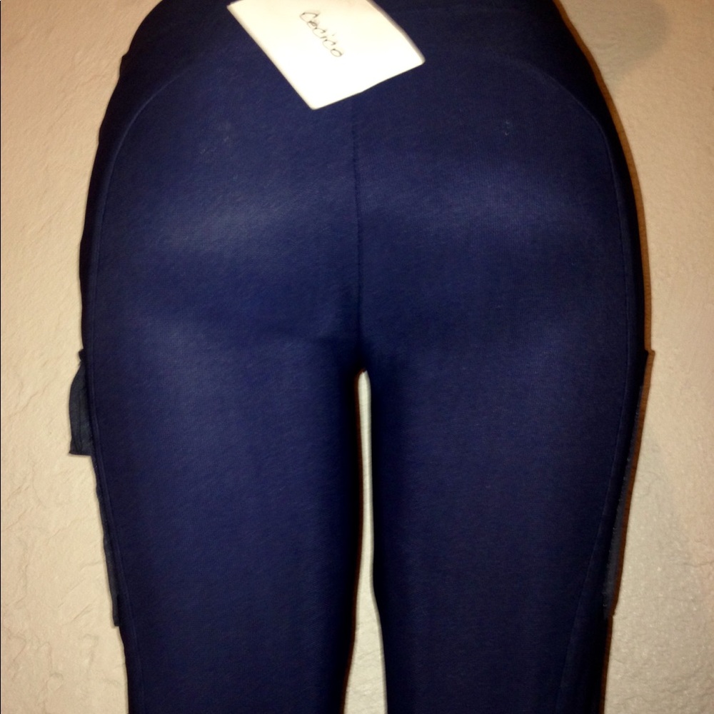 Cecico tight fit low waist pants. Stretchy Medium.