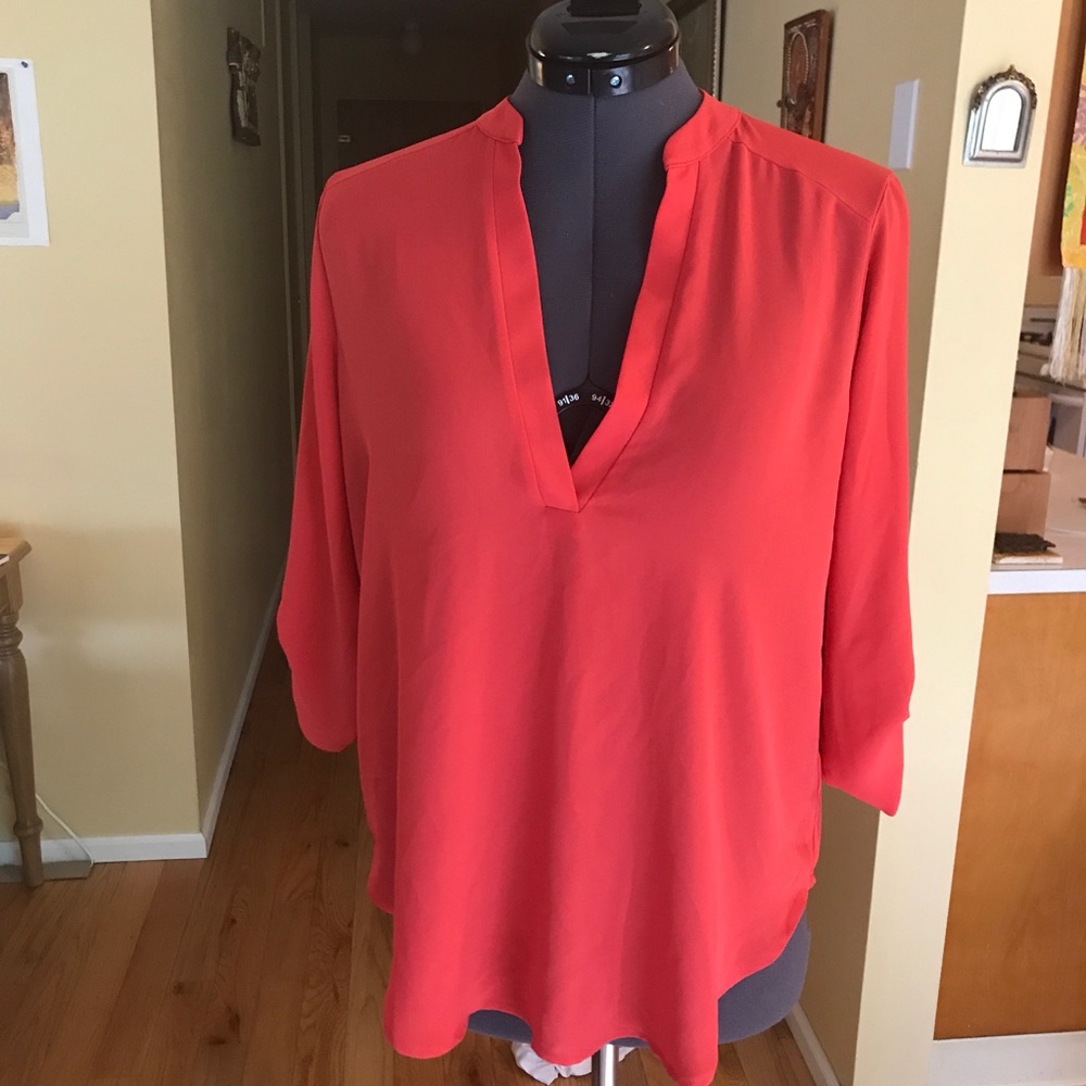 Red flowing blouse