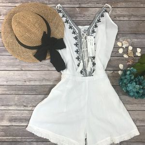 White flowy lace up Romper