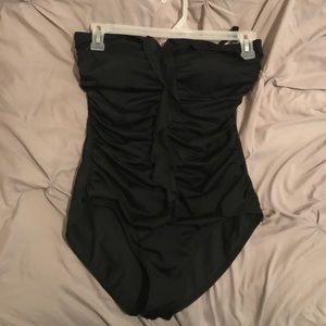One piece black bathing suit