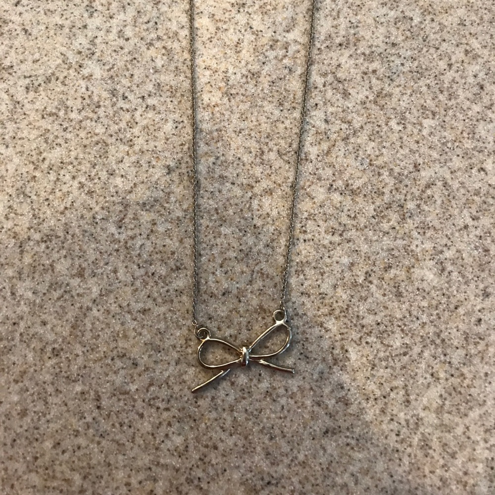 short gold bow necklace