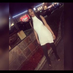 Olive green thigh high boots.