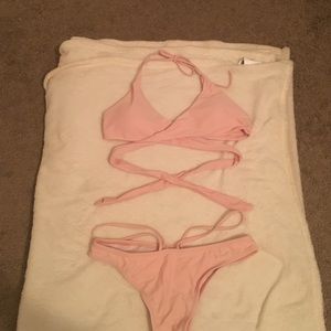 Blush pink swimsuit.