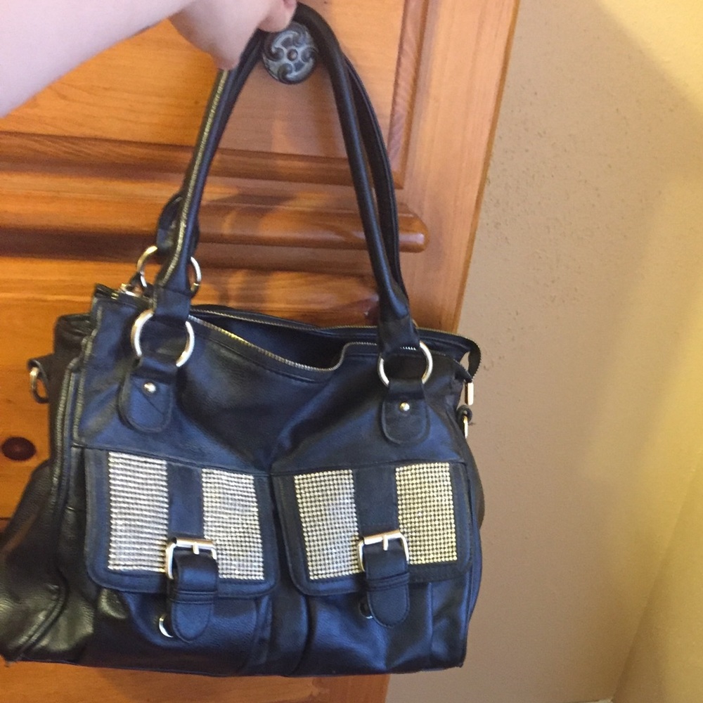 Black purse with diamonds on the front