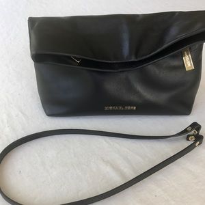 Michael Kors Clutch. Genuine leather, gold trim.