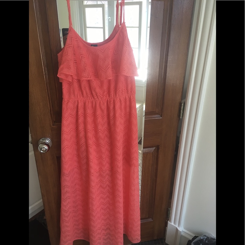 Plus size woman's coral maxi dress