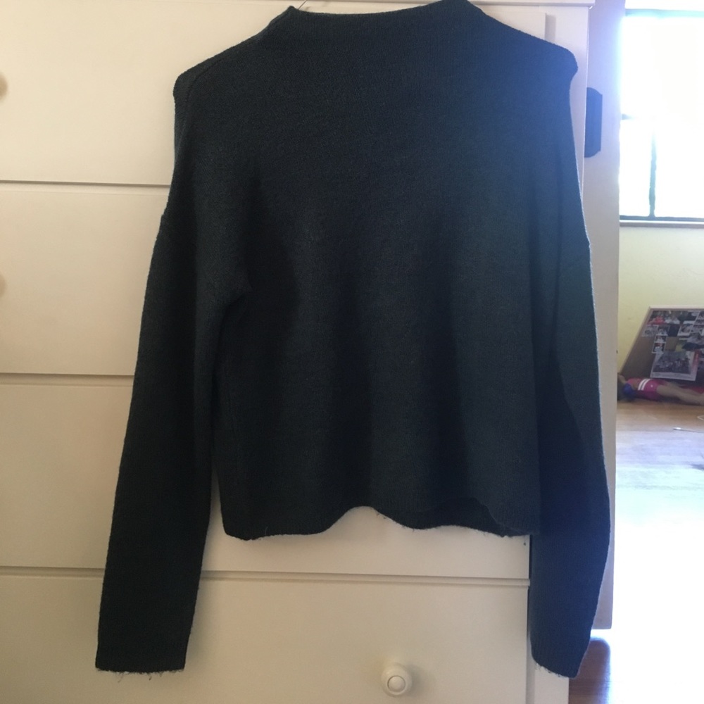 Green/teal sweater