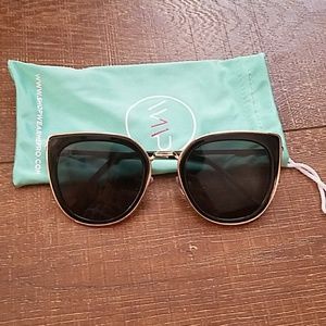 Oversize cat eye glasses, black and gold frame