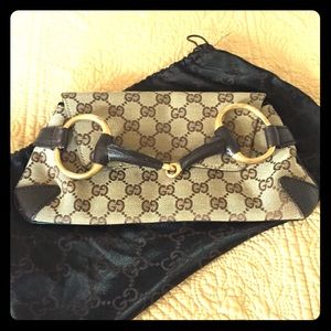 GUCCI horsebit clutch in GG canvas mono EUC