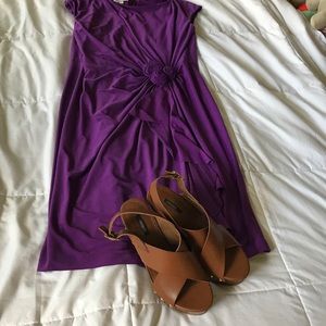 Very slimming purple dress.