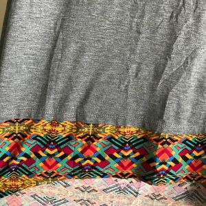 Gorgeous dipped heather gray Lularoe Irma shirt