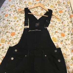 Overalls. Black overalls