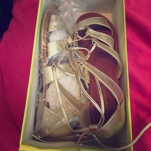Lace up gold gladiator sandals