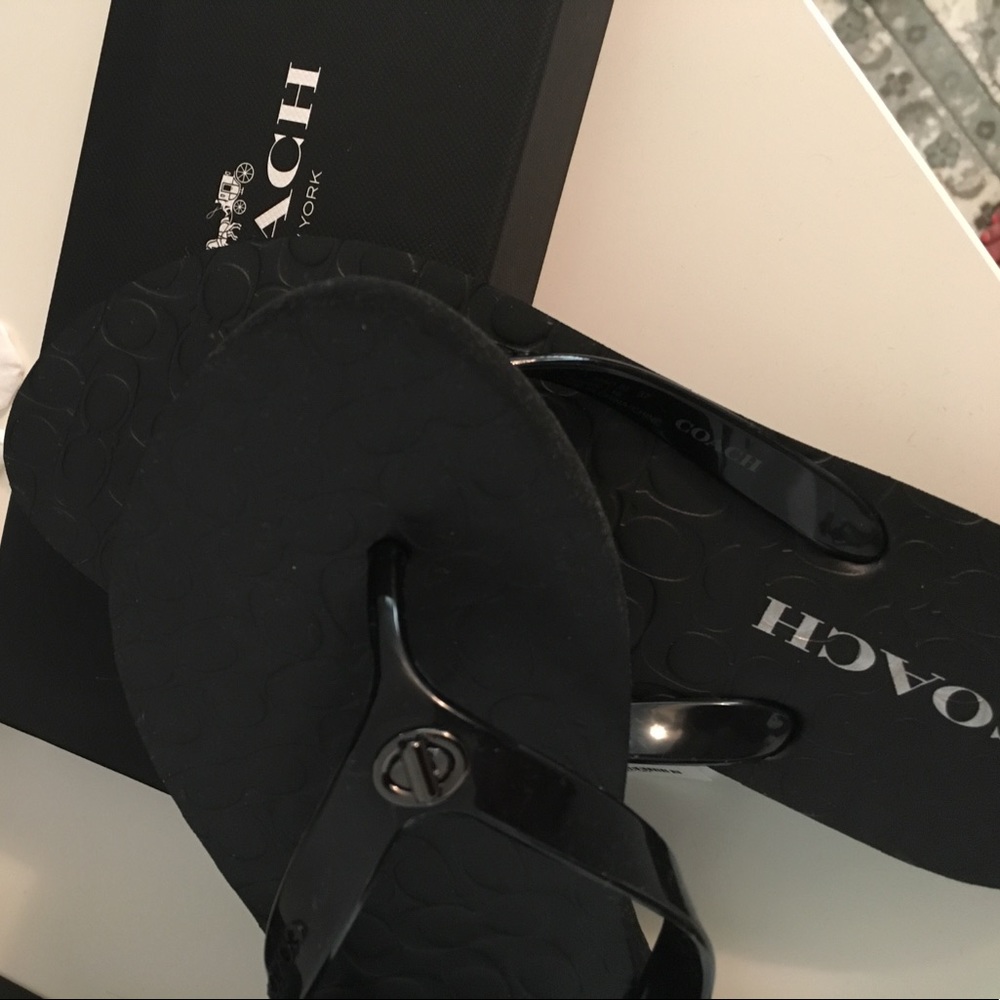 Black genuine Coach flip flops