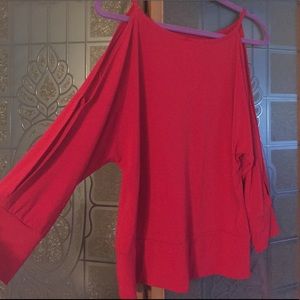 Red blouse with slit sleeve