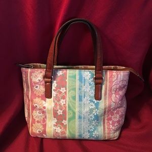 Fossil purse, does not have shoulder strap.