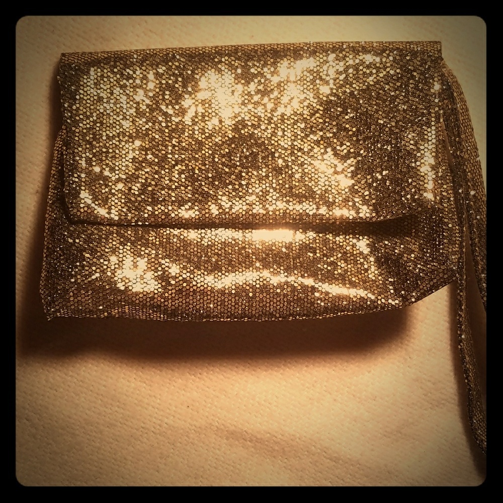 Neiman Marcus gold fabric wristlet/clutch