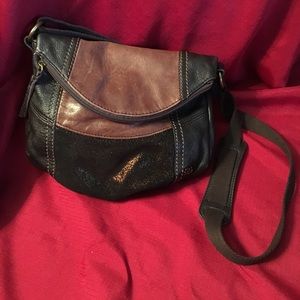 The Sak purse, brown and black leather.