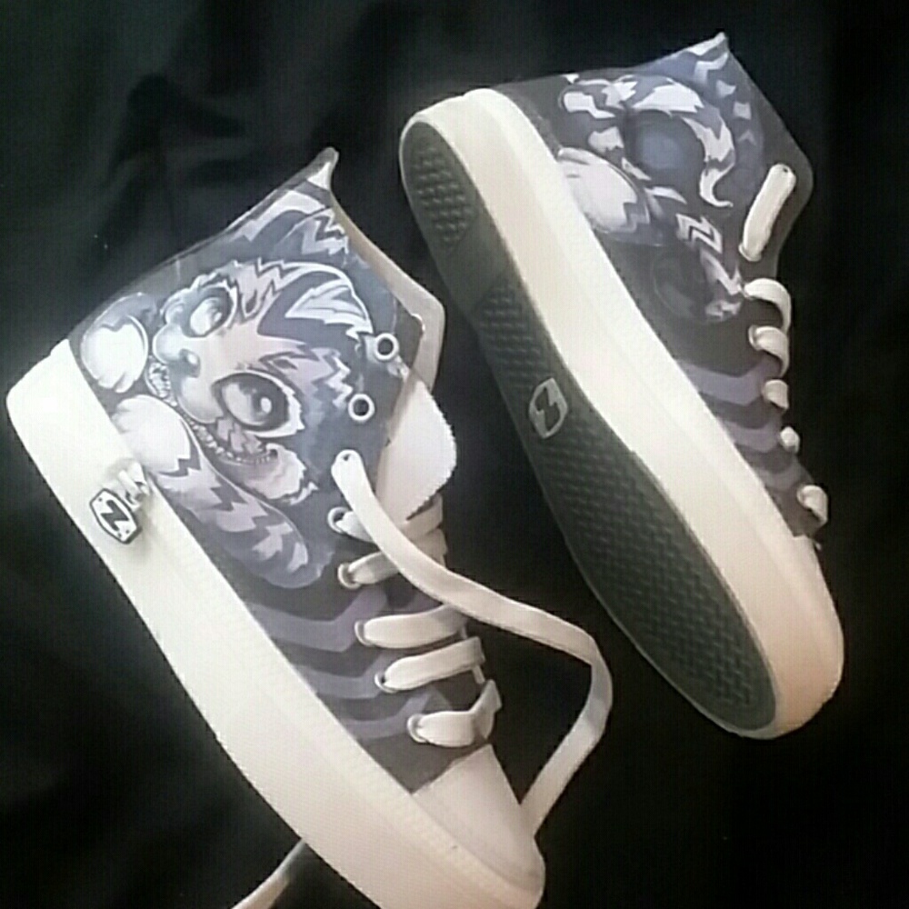 Brand new "we're all mad here" zipz shoes