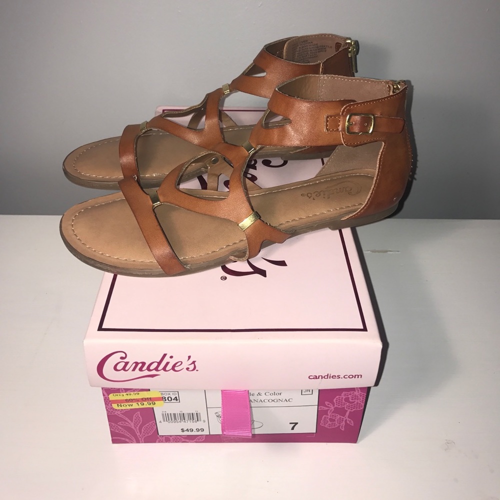 Tan sandals with gold accent