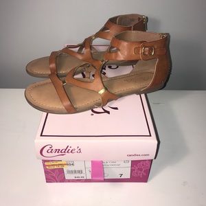 Tan sandals with gold accent