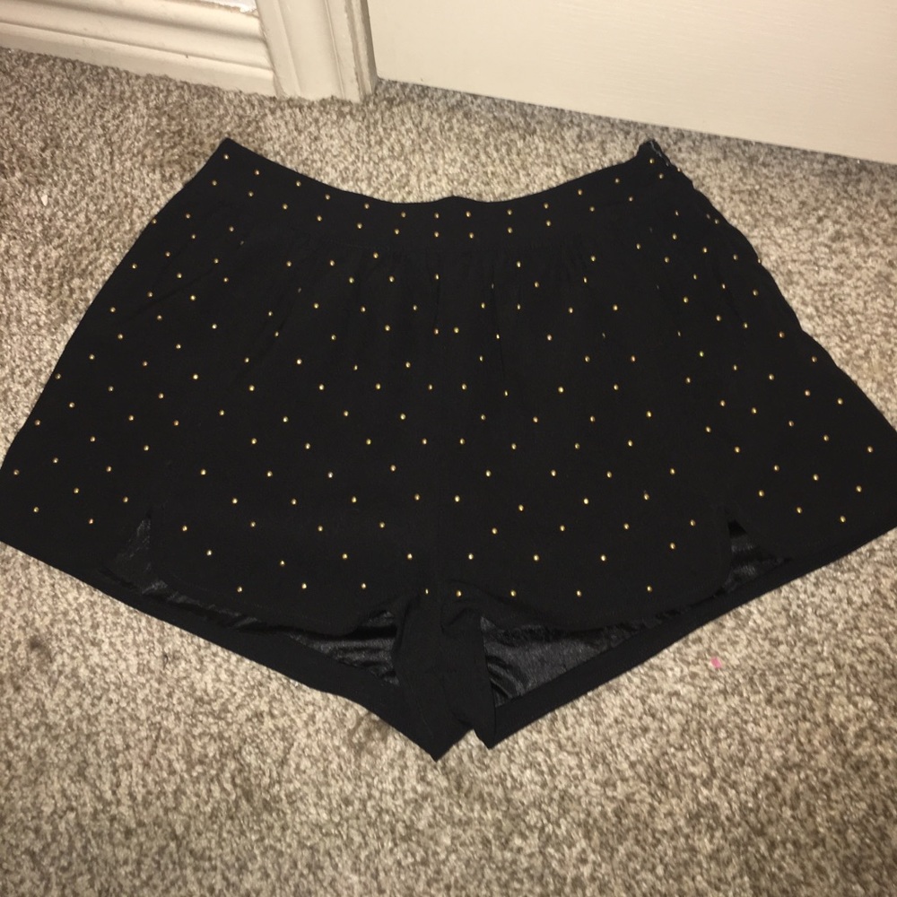 silky black shorts with gold beading
