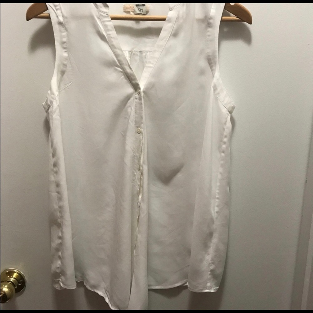 White sleeveless button down