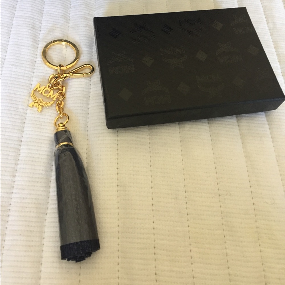 MCM GOLD TASSEL KEYCHAIN NWT