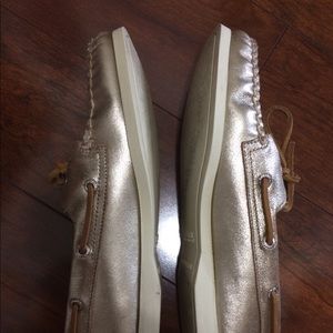 Ladies size 7.5 Sperry Top Siders In Gold