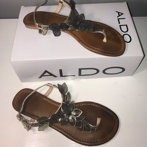 Gold sandals with wire flowers