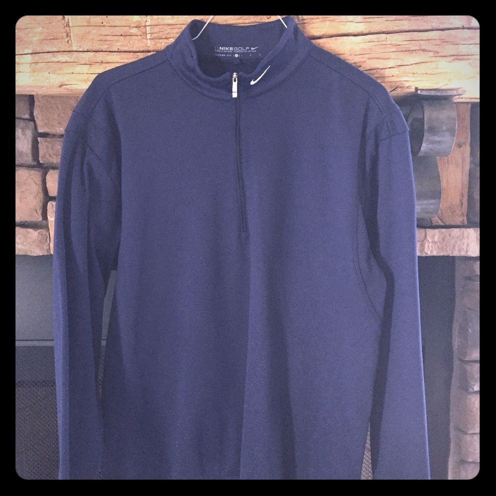 Men's long sleeve Nike Golf 1/4 zip pullover.