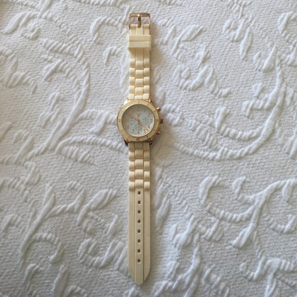 American Eagle watch with gold accents.