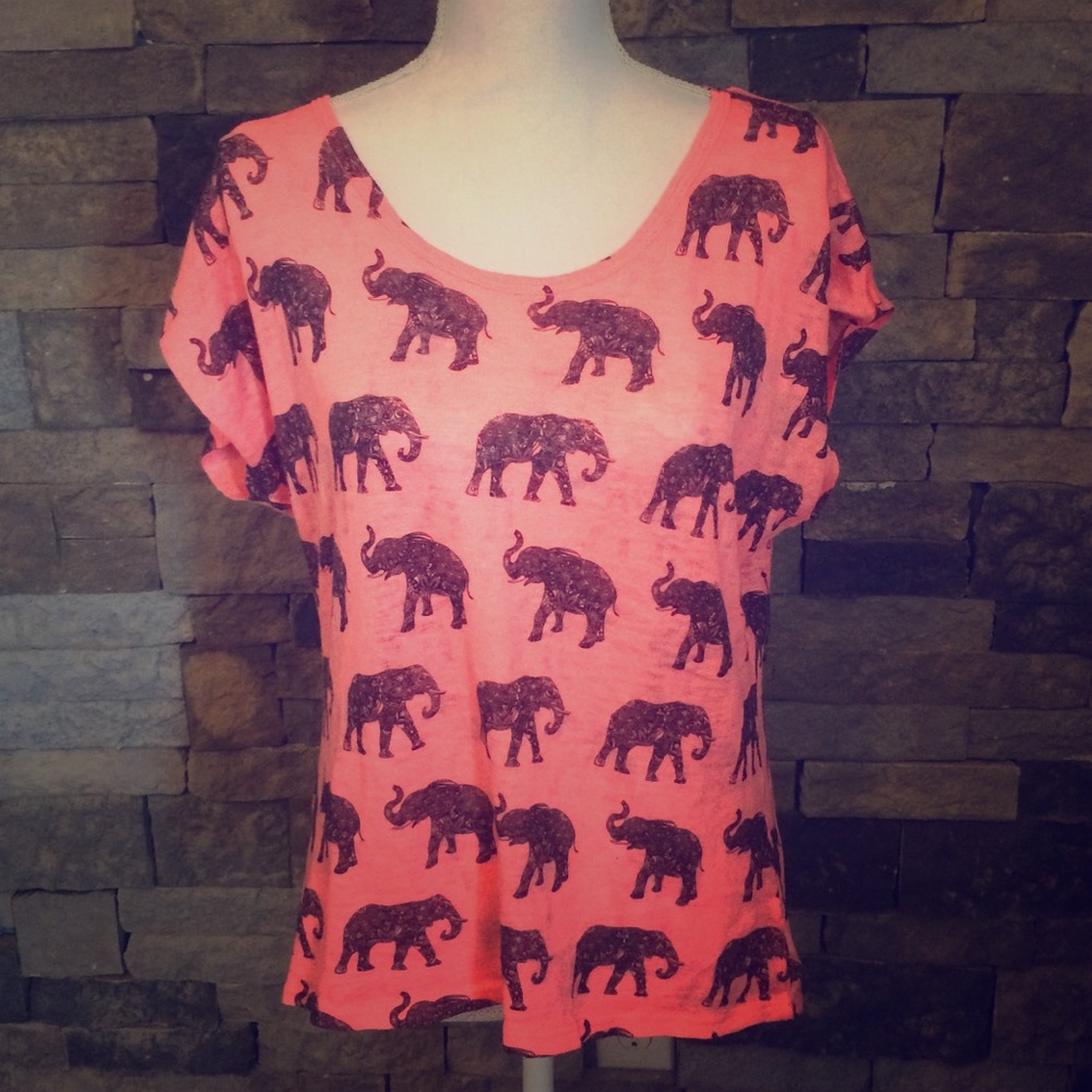 Neon pink shirt with black elephants