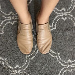 Tan slip on ballet flats