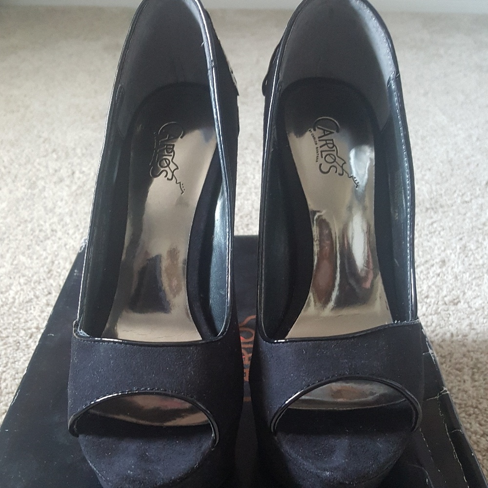 Carlos Santana black heels