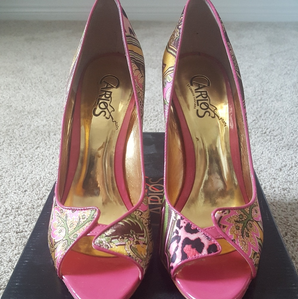 Carlos Santana pink heels