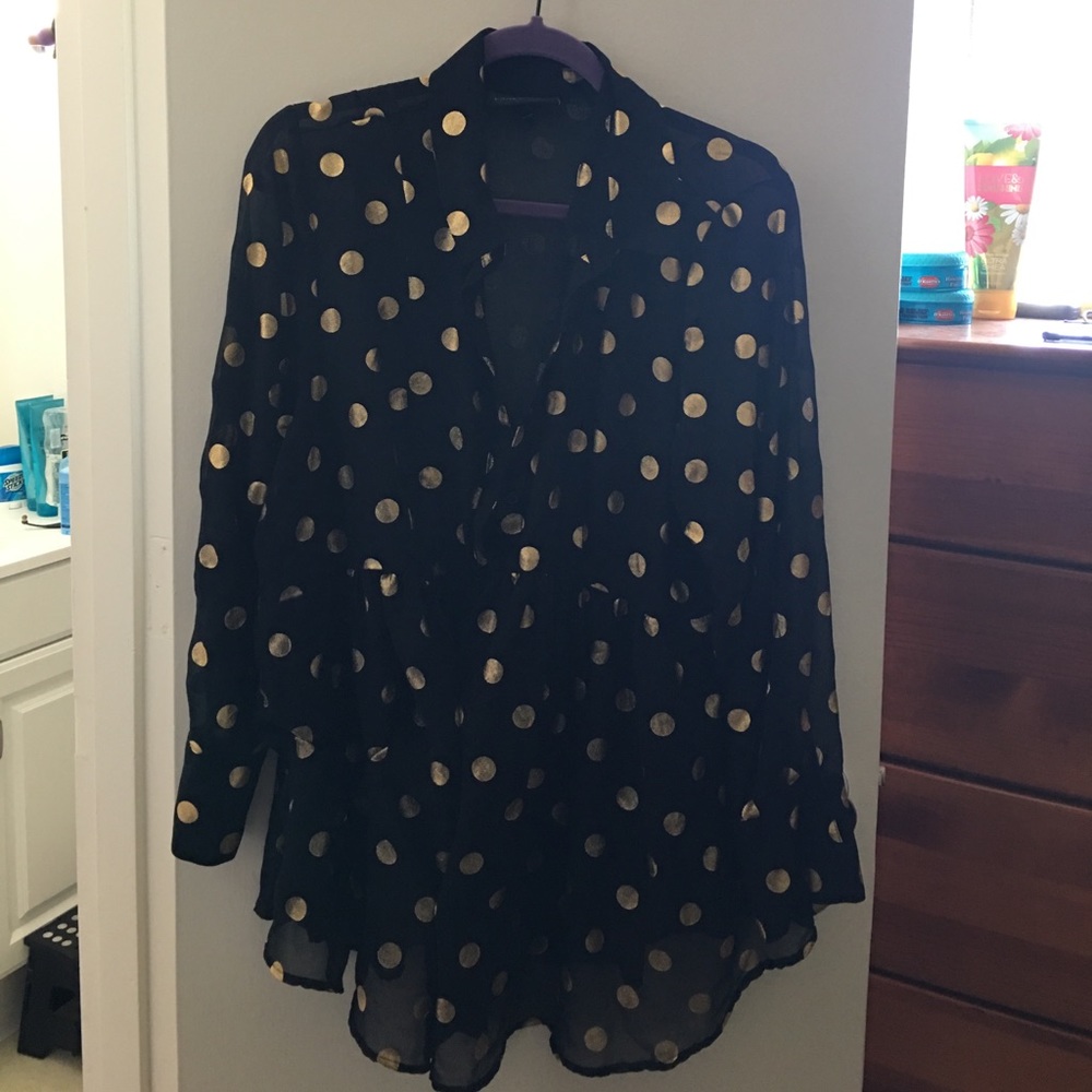 Gold dotted black babydoll top.