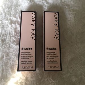 NIB lot of two MK foundations