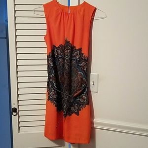 Orange dress with blue ornament