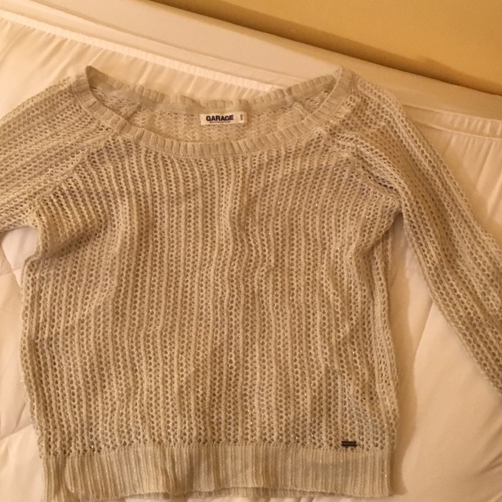 Trendy shirt from "Garage", size M runs small